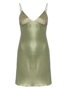 light green/beige silk satin V-neck Chantilly lace adjustable spaghetti straps slip silhouette curved hem thigh-length We've partnered with Good On You — an independent agency that rates how brands perform in relation to their impact on the planet, people and animals, with a multi-criteria rating simplified to a five points scale. In order to be awarded our conscious label, larger brands need to score a minimum of four out of five ('Good'), while smaller brands must score at least three out of f