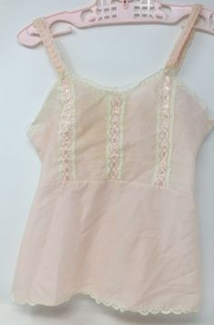 Vintage Girls Toddlers Pink Cotton Dress Slip Petticoat With Lace & Ribbon Trim In good vintage condition, with light stain on back Please view pics as they are part of the description Measures approx 15 1/2" long, by 11" arm pit to arm pit, 9 1/2" a