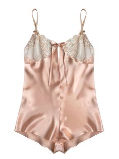 Experience luxury with this vintage-inspired peach silk teddy featuring sheer Oeko-Tex certified lace cups. Made from 100% silk, it boasts sheer cups crafted from 69% recycled polyamide, 10% cotton, and 21% elastane, all certified under the Standard 100 by Oeko-Tex. The bias-cut design creates a flattering shape as it gracefully skims along the body. The adjustable peach straps, adorned with gold rings and sliders, enhance both comfort and style. This piece offers a loose fit with a French knick