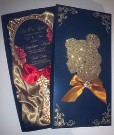 the wedding card is decorated with gold glitters and a teddy bear on it's back